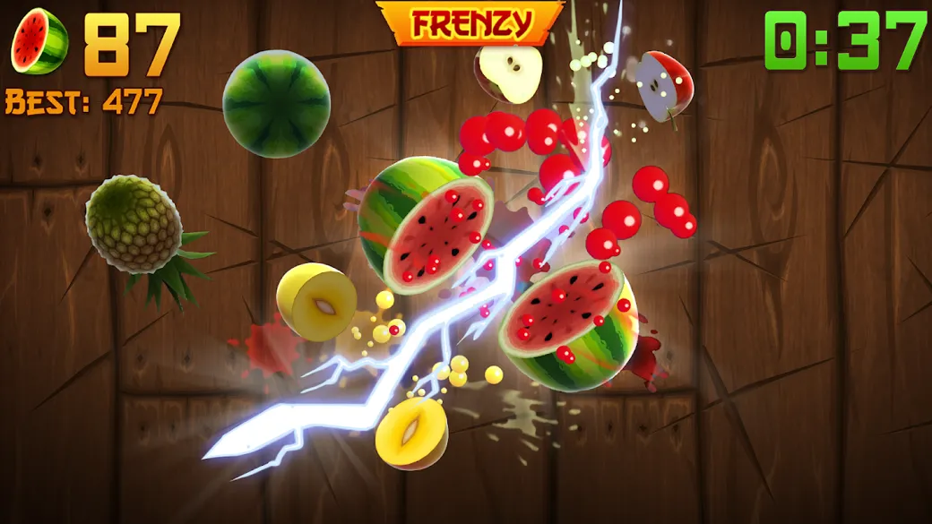 Schermata di gioco di Fruit Ninja: angurie e altra frutta tagliate a metà volano in aria con una scia luminosa del taglio, contatore e modalità Frenzy in alto.
